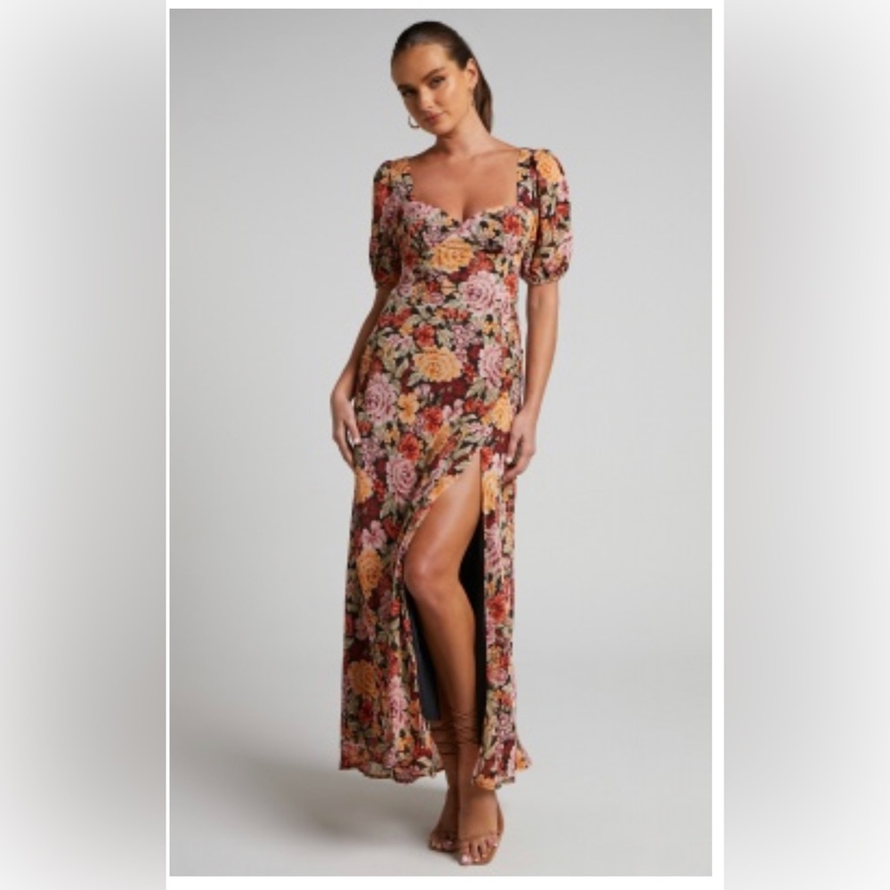 Brand new dress with tags. Beautiful dress, but small in the chest. Tags on